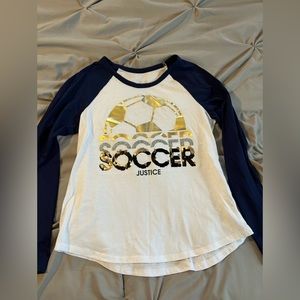 Justice kids soccer shirt.